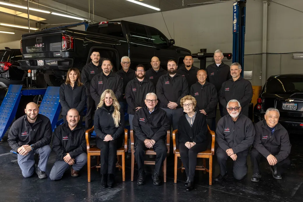 Electric Laboratories Fresno auto repair team in workshop.